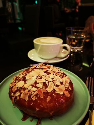 Almond donut and matcha latte at Veginity in Dublin