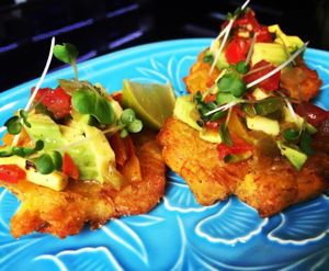 Tostones. Green plaintains with a roasted pepper guacamole and pink salt and lime. at Veginity in Dublin