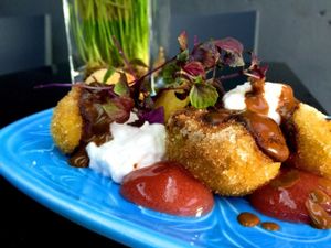 Peach Donut Drop Donut with Cherry Gel and coconut Creme and an 85% chocolate Ganache at Veginity in Dublin