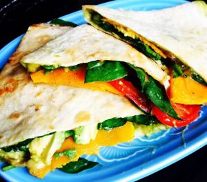 Piadina with Avocado, Roast Pumpkin, Tomato, Violife Cheese and Chermoula. at Veginity in Dublin
