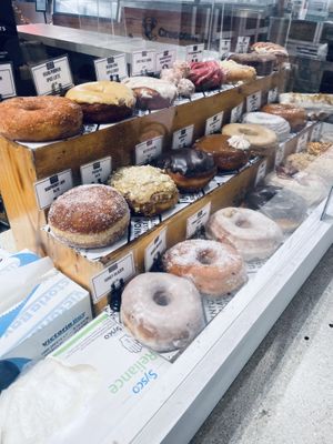 Three vegan donuts top left corner  at Union Square Donuts in Boston