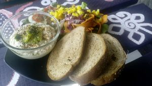 Hummus served with salad and brown bread  at Kaya Caffe in Koh Lanta