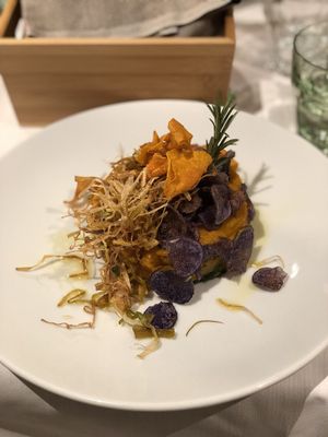 Pumpkin timbale with lentil ragout flavored with thyme and served on a bed of chard - Vegan/GlutenFree at La Piazzetta in Verona