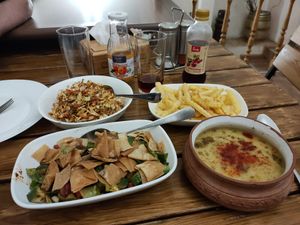 Cabbage salad, fries, lentil soup, fattoush at Zatar Pizza in Yerevan