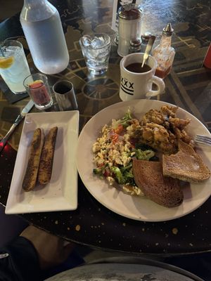 VEGAN Tofu Scramble with sweet potato hash and wheat toast with vegan butter and a side of vegan sausage. Coffee/with oat milk and a lemonade   at Julian's in Providence