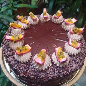 Cake passion fruit and milk chocolate at Comptoir Veggie in Paris