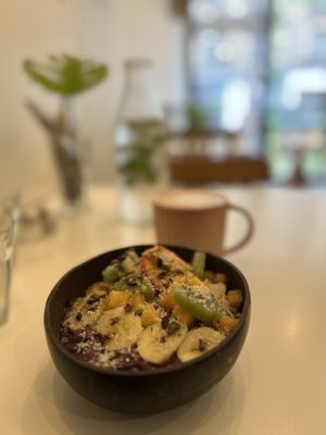 Açaí bowl and oat milk latte  at Comptoir Veggie in Paris