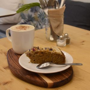 moist carrot cake + chai latte  at Comptoir Veggie in Paris