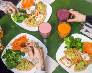 Savory vegan waffle, served with guac and vegan cream cheese, everything homemade and delicious! at Comptoir Veggie in Paris