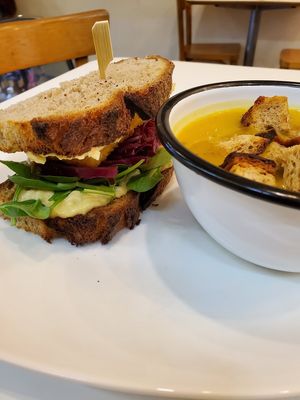 Chickpea salad/tofu sandwich and squash soup with croutons at Comptoir Veggie in Paris