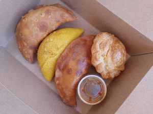 Chik'n & Potato Empanada, Potato & Spanish Seasoning Empanada, Apple Pastelito, and Meat Pastelito, at The Happy Vegan Bakers in Hialeah