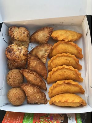 From right to left: Fried empanadas, baked empanadas(vegan beef and chicken), cheese tortas, and potato tortas at The Happy Vegan Bakers in Hialeah