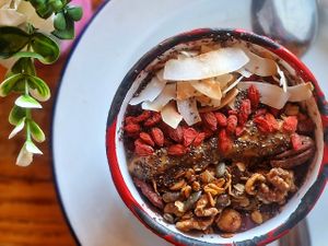 Açai bowl, banana, home-made granola, chia seeds, coconut flakes and goji berries at Project Social in Ibiza