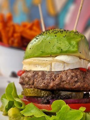 BEYOND - Plant based vegan burger with vegan mayo, goats cheese and an avocado bun at Project Social in Ibiza
