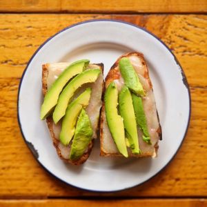 Tostada on 100% spelt bread with tomato, vegan cheese and avocado at Project Social in Ibiza