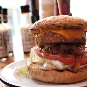 Beyond Burger with vegan cheese, vegan mayo, caramlised onions on 100% spelt vegan bun at Project Social in Ibiza