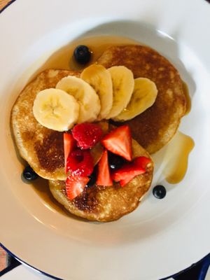 Pancakes with maple fruit and  maple syrup at Project Social in Ibiza