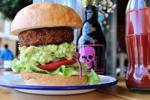 Luna - baked sweet potato, quinoa, and sweet paprika patty, with guacamole. at Project Social in Ibiza