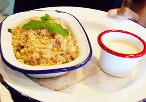Vegan crumble with vegan custard at Project Social in Ibiza