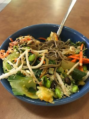 vegetarian bowl with buckwheat noodles and loads of veggies, hot sauce, cilantro, green onions, carrots at Nice Noodles in Omaha
