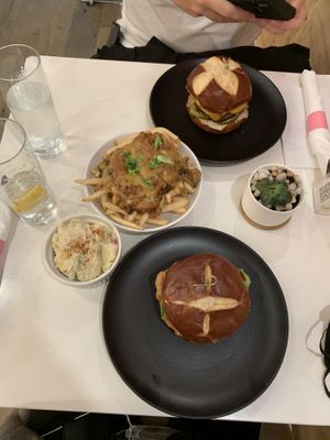 Smokey bbq burger, Thia chkn sandwich, potato salad and chili cheese fries.  at P.S. Kitchen in New York City