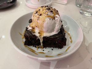 Special brownie with coconut ice cream & chocolate sauce  at P.S. Kitchen in New York City