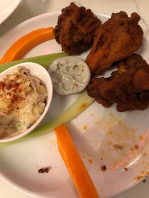 Mitake Wings. Star of the night. 3 sauces available. Chose Buffalo YUM. Side of potato salad divine. Sorry had started eating when I realized I had to share this with the world at P.S. Kitchen in New York City