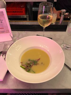 Colombian Potato Soup and a glass of Gruner Veltline at P.S. Kitchen in New York City