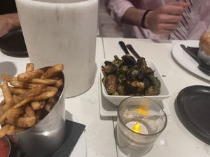 Brussels sprouts and fries  at P.S. Kitchen in New York City