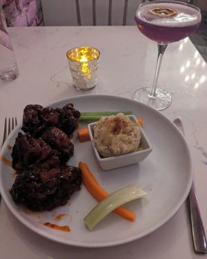 Mushroom "wings" and potato salad. 💚 at P.S. Kitchen in New York City