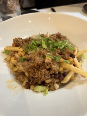 Chili cheese fries are a mustt  at P.S. Kitchen in New York City