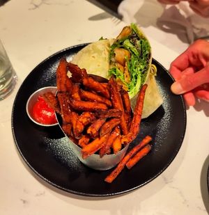 Beyond wrap with sweet potato fries at P.S. Kitchen in New York City