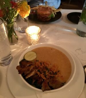 Ginger congee and Beyond Meat burger at P.S. Kitchen in New York City