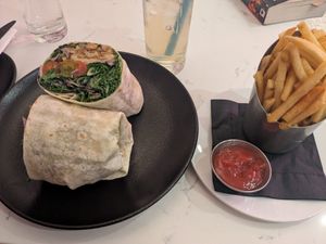 Caesar salad wrap and fries at P.S. Kitchen in New York City