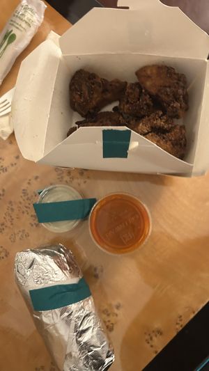 Maitake “wings” and chicken Ceasar wrap  at P.S. Kitchen in New York City