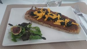 Tostada de sobrasada vegana. at El Secret in Falset