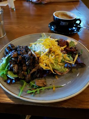 toast with avocado,vegan cheese,mushroom and sundried tomatoes at Zenith in Porto