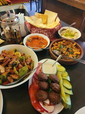 Falafel, Fattoush-Salad, potatoes with dill, Hummus & Muhammara at Taboule Lebanese Restaurant in Yerevan