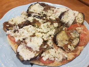 Eggplant pizza with vegan cheese at Twins Cafe GF in Lima