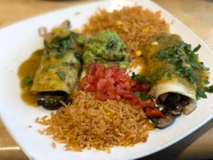 Sweet potato enchiladas with added mushroom and avocado. 🤗 at Ed's Cantina & Grill in Estes Park