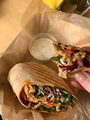 Tempeh buffalo wrap with almond milk ranch dressing. Comes with a side of potato chips  at Ultra Coffeebar in Asheville