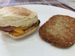 Breakfast sandwich & hashbrown  at Plant Power Fast Food - Encinitas in Encinitas