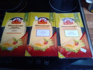 Three of the flavours of Wilmersburger vegan cheese slices available at Mimint Bio Market in Arnhem