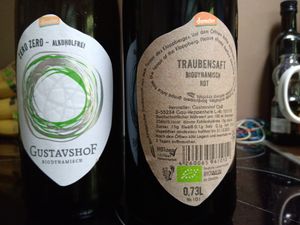 Alcohol-free wine (vegan labelling visible on the back label) at Mimint Bio Market in Arnhem