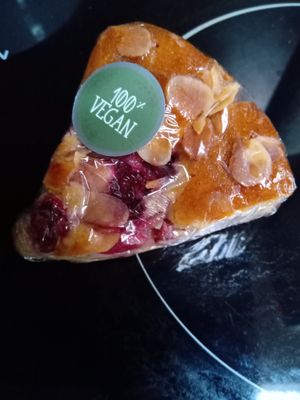 Slice of almond and cranberry cake at Mimint Bio Market in Arnhem