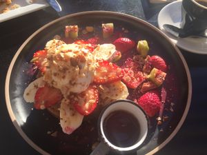 Pancakes with yogurt and fruit at Gathered Kitchen in Glebe
