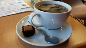 Coffee cane with a vegan choc on the side! at Mocha in Richmond