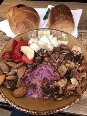 Açai bowl and vegan croissant  at Shake Cafe - Del Corso in Florence