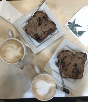 Two slices of banana bread and oat milk cappuccinos at Shake Cafe - Del Corso in Florence