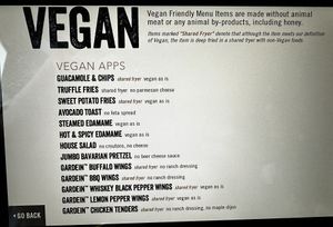 Kiosk on table shows how to order the vegan options under Nutritional Menus  at Yard House in St Louis Park